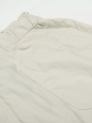 Men's gray wide-leg sweatpants with elastic waistband and pocket detail