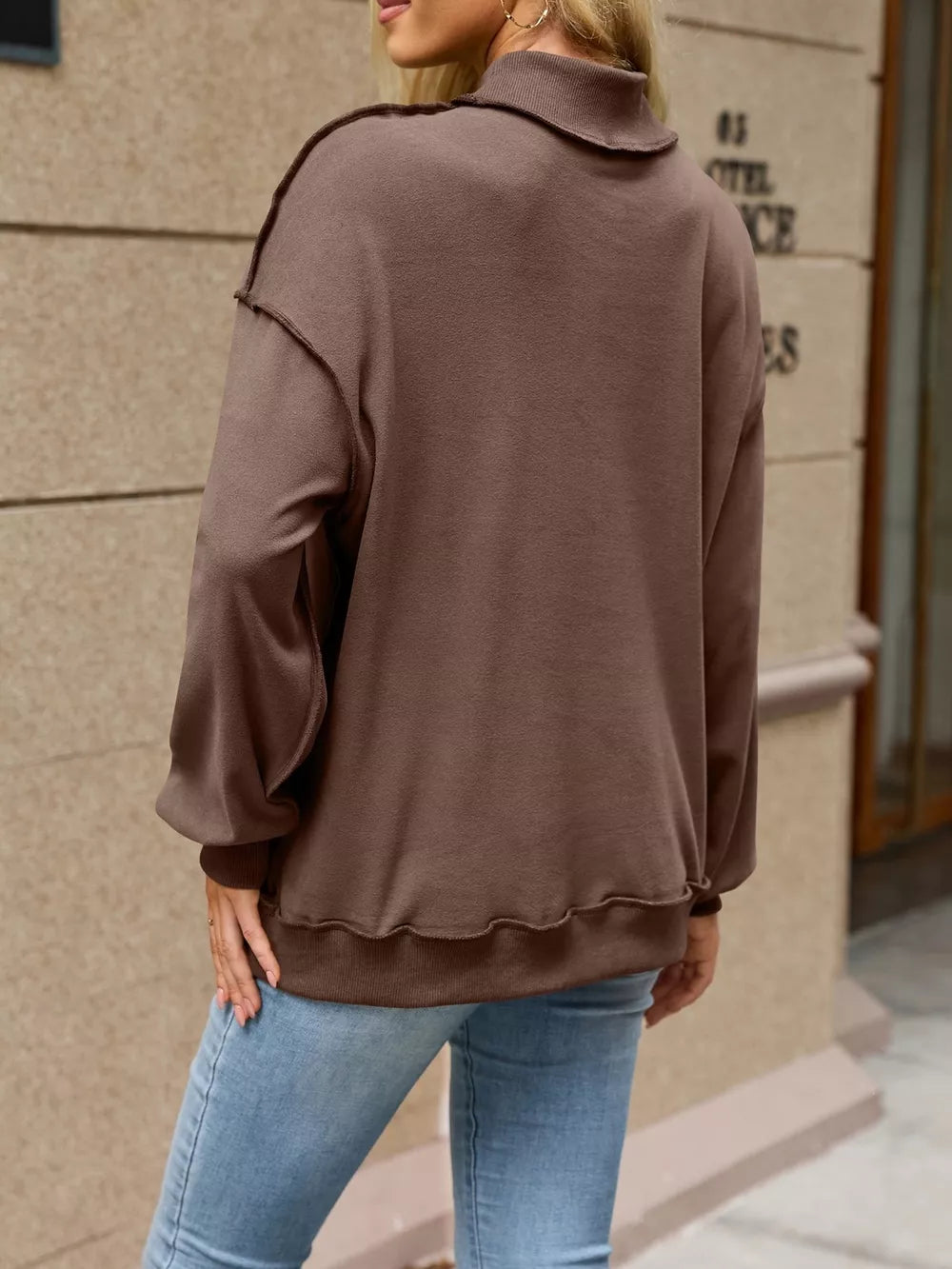 Loose Fit Crew Neck Sweatshirt in Brown with exposed seam