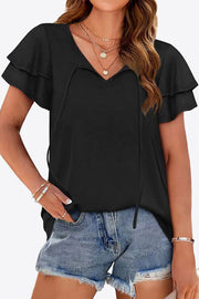 Black tiered sleeve keyhole blouse with tie detail and v-neck