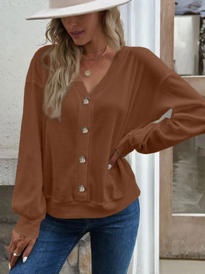 Caramel waffle knit button-down cardigan with V-neck and button closure