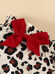 Baby bodysuit with leopard print and red bow detail