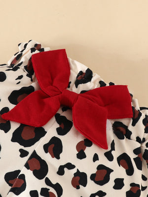 Baby bodysuit with leopard print and red bow detail
