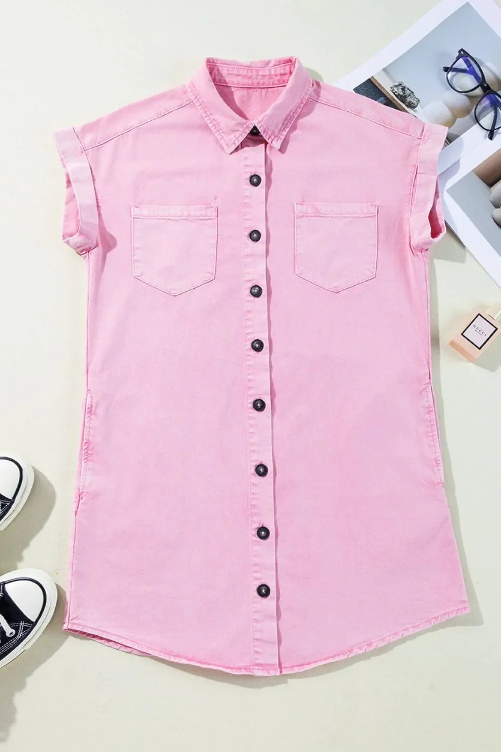 Rolled sleeve denim shirtdress in blush pink with button front and chest pockets.
