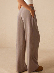 Mocha ribbed palazzo lounge trousers with pockets, wide leg, and cotton blend fabric.