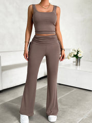 Taupe ribbed ruched waist tank top and flare pants set with drawstring details.