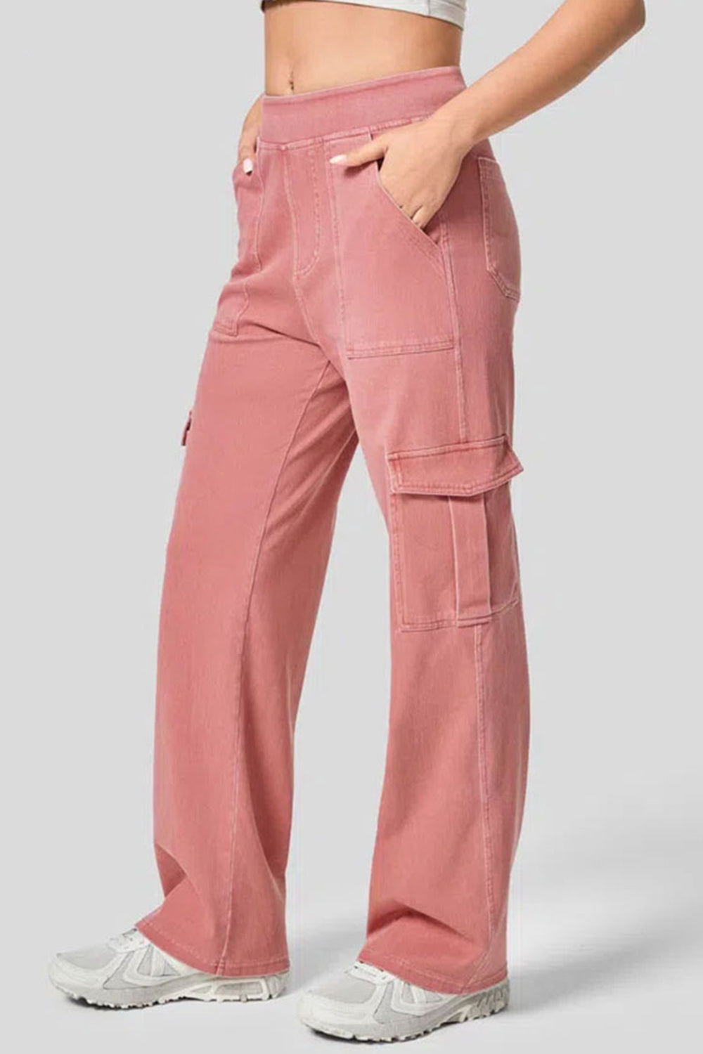 Utility denim wide-leg cargo pants in Burnt Coral with front pockets and side cargo pockets.