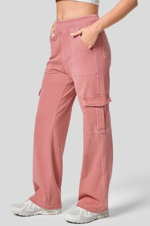 Utility denim wide-leg cargo pants in Burnt Coral with front pockets and side cargo pockets.