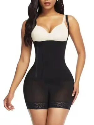 Black lace-trimmed shaping romper with adjustable straps and sheer leg panels.