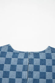 Checkered denim mini dress with frayed hems and a round neckline.