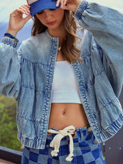 Washed denim zip-up jacket with tiered sleeves and elastic cuffs.