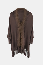Chocolate faux fur trimmed fringe cape with wide sleeves.