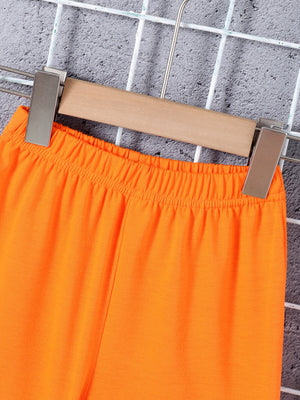 Boys' orange cotton shorts with elastic waistband