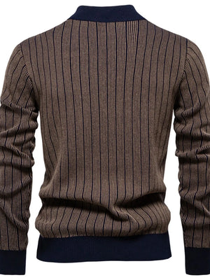 Brown ribbed mock neck sweater with vertical navy stripes and navy cuffs.