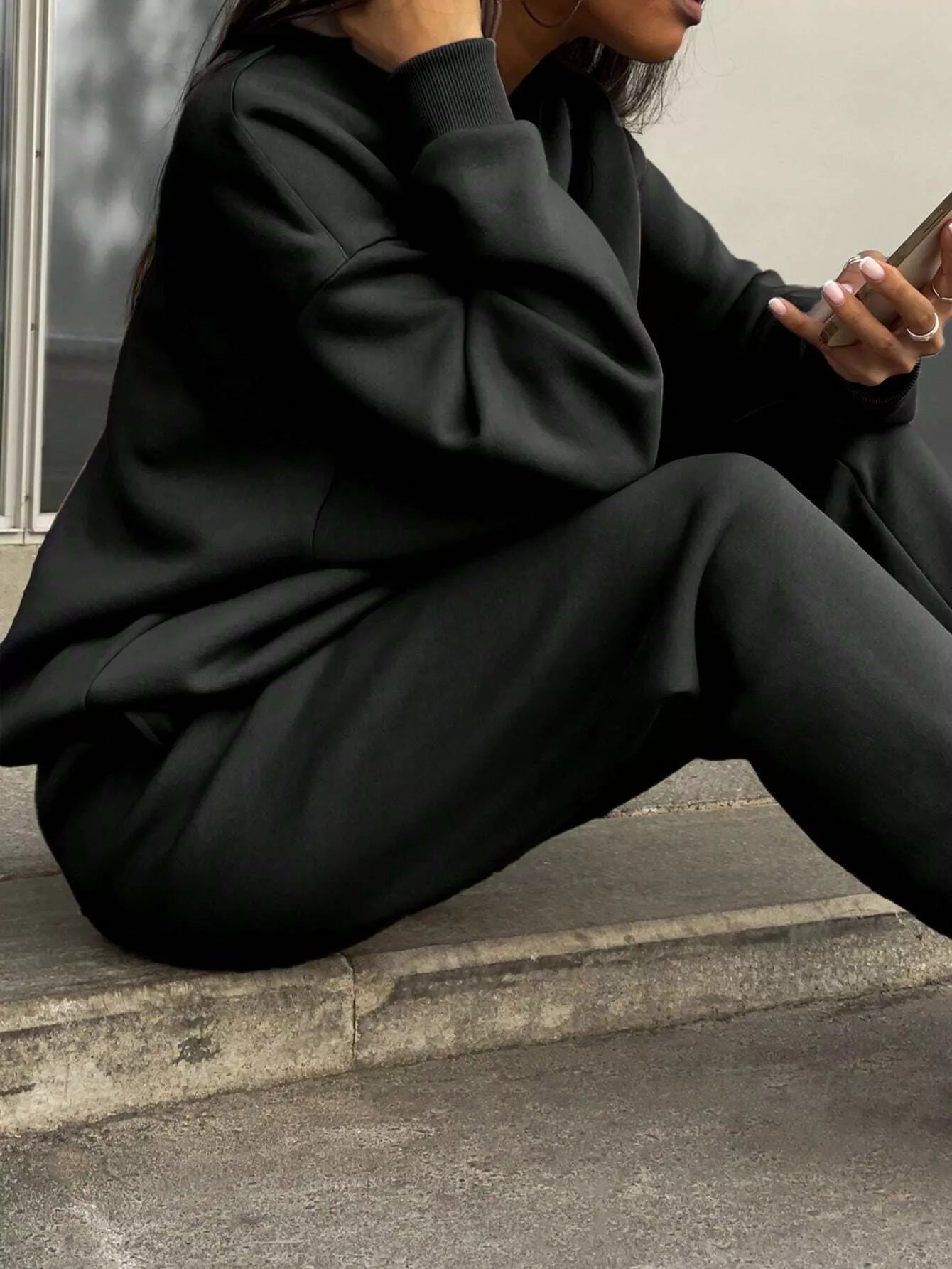 Black half zip sweatshirt and matching pants set, comfortable athleisure outfit