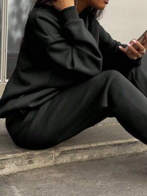 Black half zip sweatshirt and matching pants set, comfortable athleisure outfit