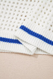 White eyelet knit sweater with blue striped cuffs and hem
