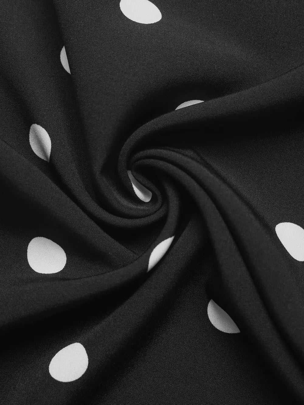 Black polka dot strapless wide-leg jumpsuit fabric detail