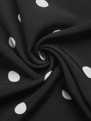 Black polka dot strapless wide-leg jumpsuit fabric detail