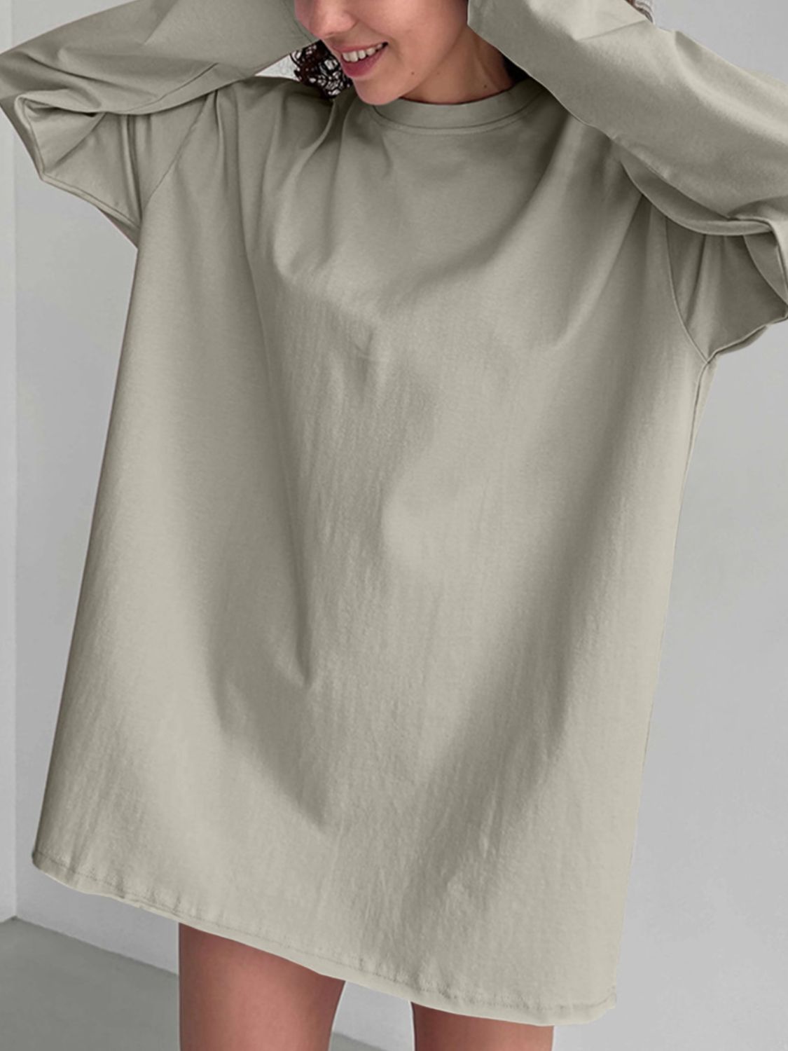 Oversized taupe cotton jersey long sleeve top with crew neck.