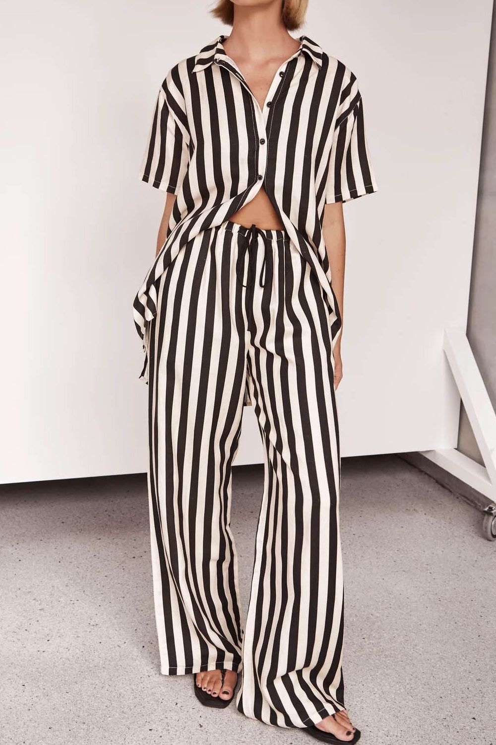 Vertical stripe lounge set with cutout top and wide-leg pants in white and black