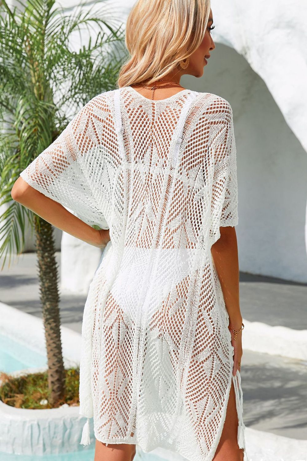White open-knit caftan cover-up with chevron pattern, side slits and tassels.