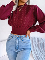 Burgundy openwork knit sweater with puff sleeves and mock neck, cropped length
