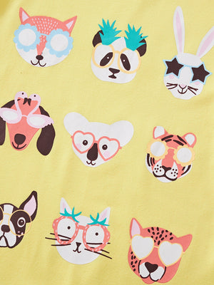 Yellow crew neck t-shirt with playful animal faces graphic print.