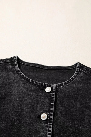 Black denim vest with button front and round neckline.