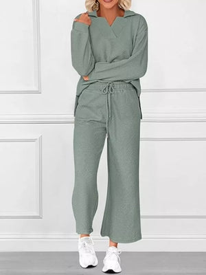 Sage V-neck textured lounge set with diagonal pattern pants and long sleeves.