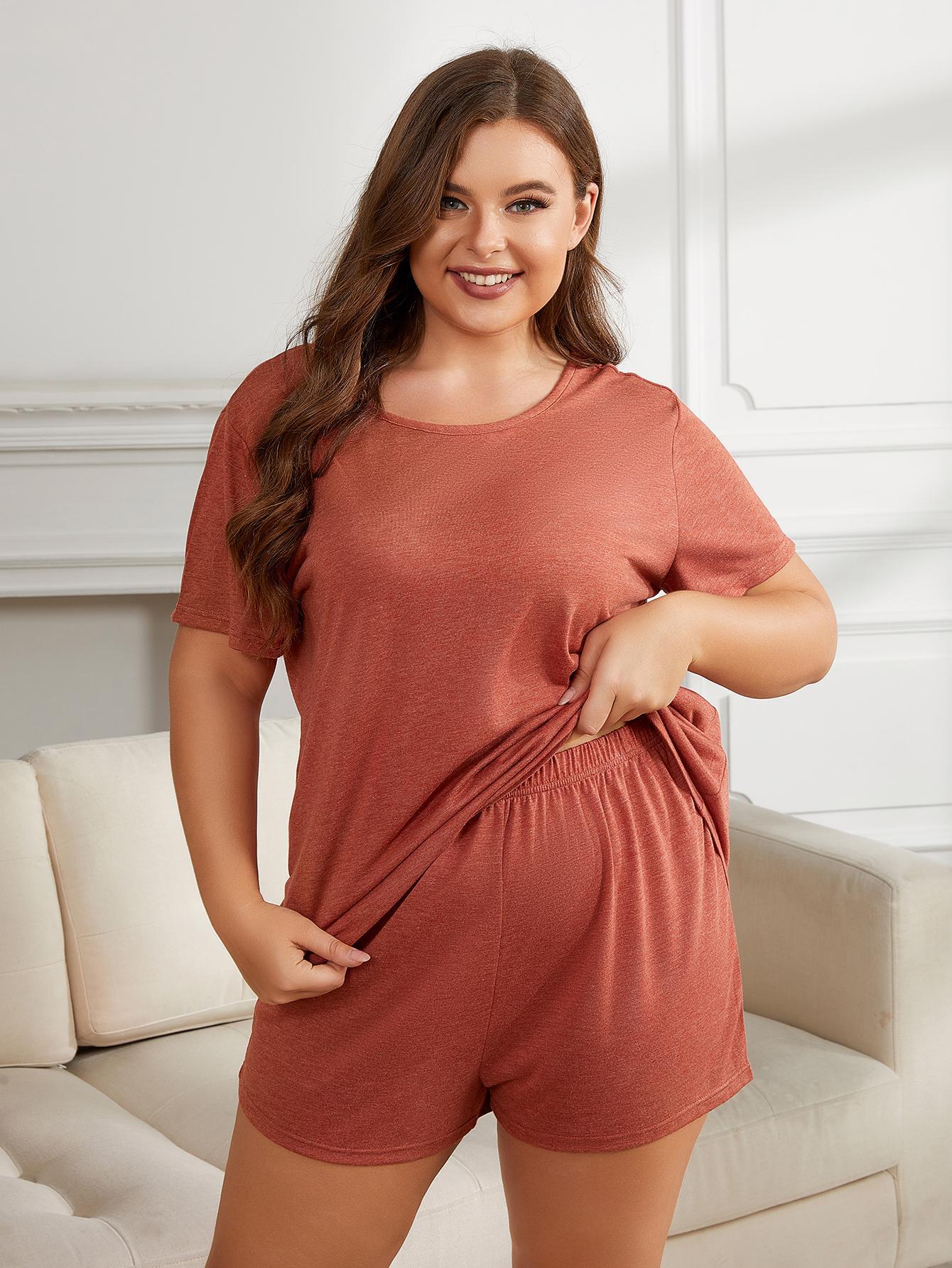 Relaxed fit rust jersey lounge set with crew neck tee and elastic waist shorts.