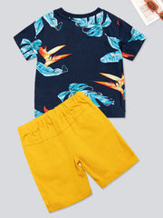 Toddler boys' cotton set with navy tropical print tee and yellow shorts.