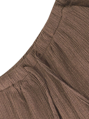 Brown crinkled wide-leg pants with drawstring waist detail