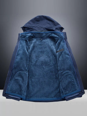 Blue hooded jacket with plush fleece lining and zippered pockets.