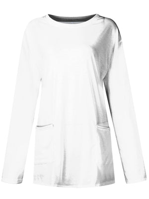 White relaxed fit tunic with long sleeves and two patch pockets.