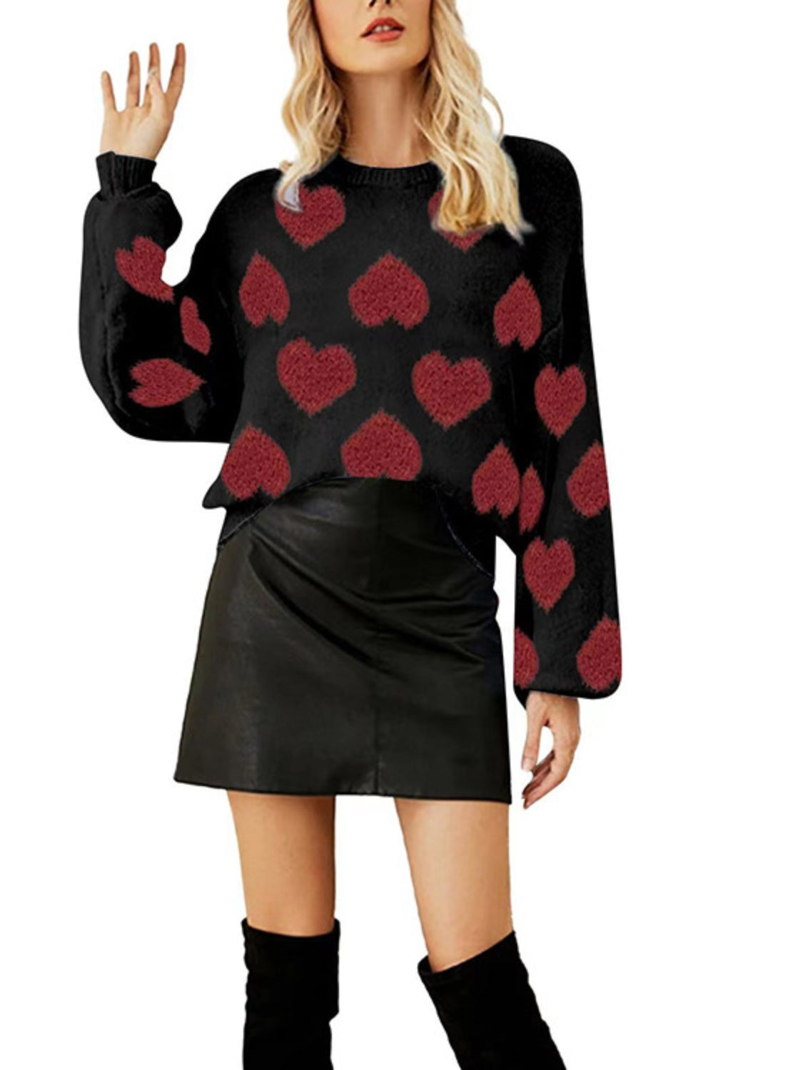 Black acrylic blend sweater with red heart motif and balloon sleeves.