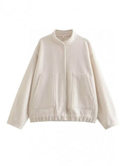 Beige boucle cocoon jacket with snap closure and patch pockets