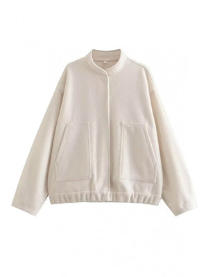 Beige boucle cocoon jacket with snap closure and patch pockets