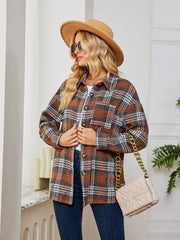 Brown plaid shacket with oversized buttons and chest pocket, styled with a white tee and jeans.