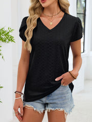 Black eyelet petal sleeve v-neck tee with textured pattern.