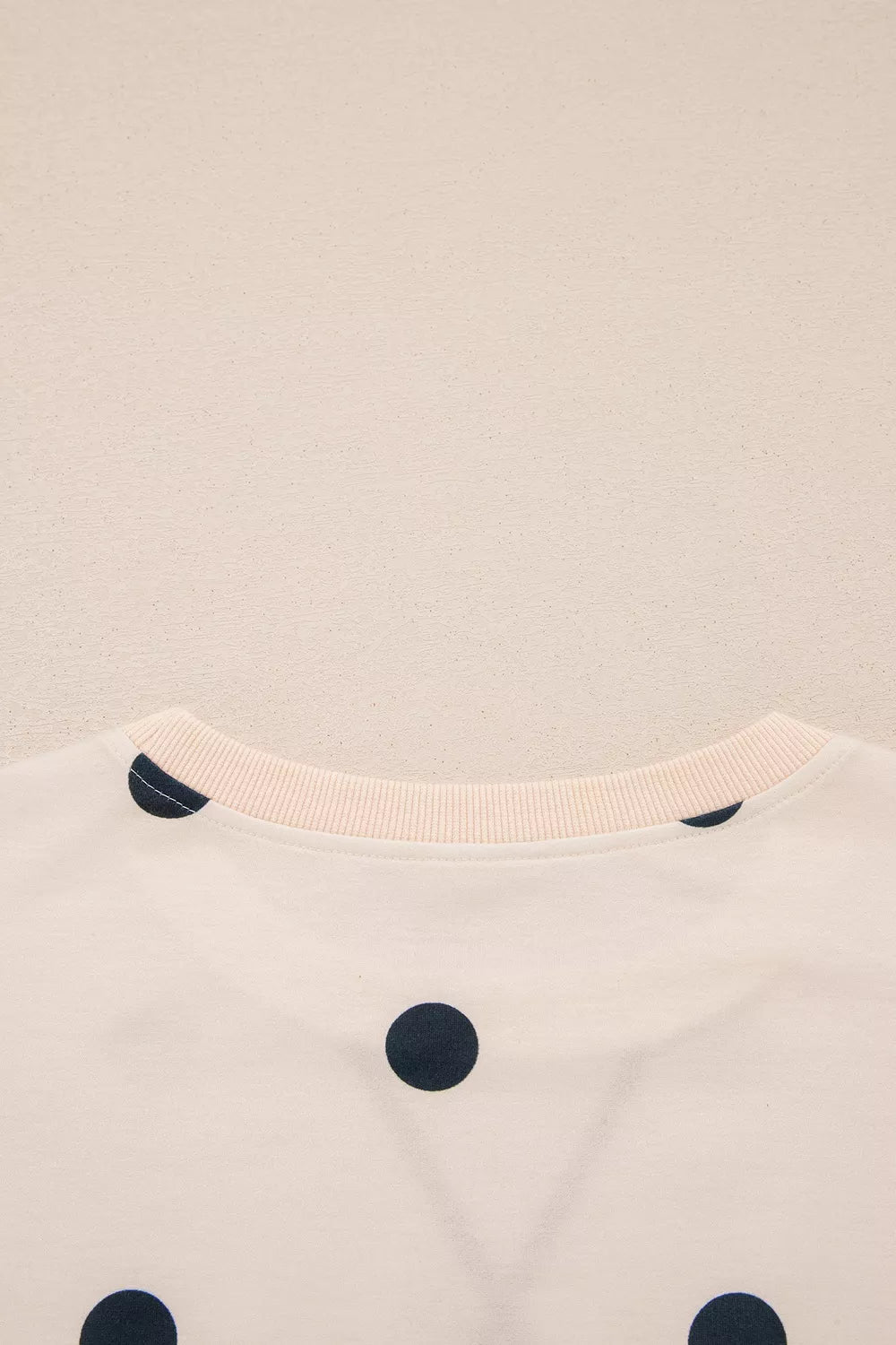 black tunic with pullover and polka dot