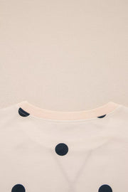 black tunic with pullover and polka dot