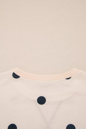 black tunic with pullover and polka dot