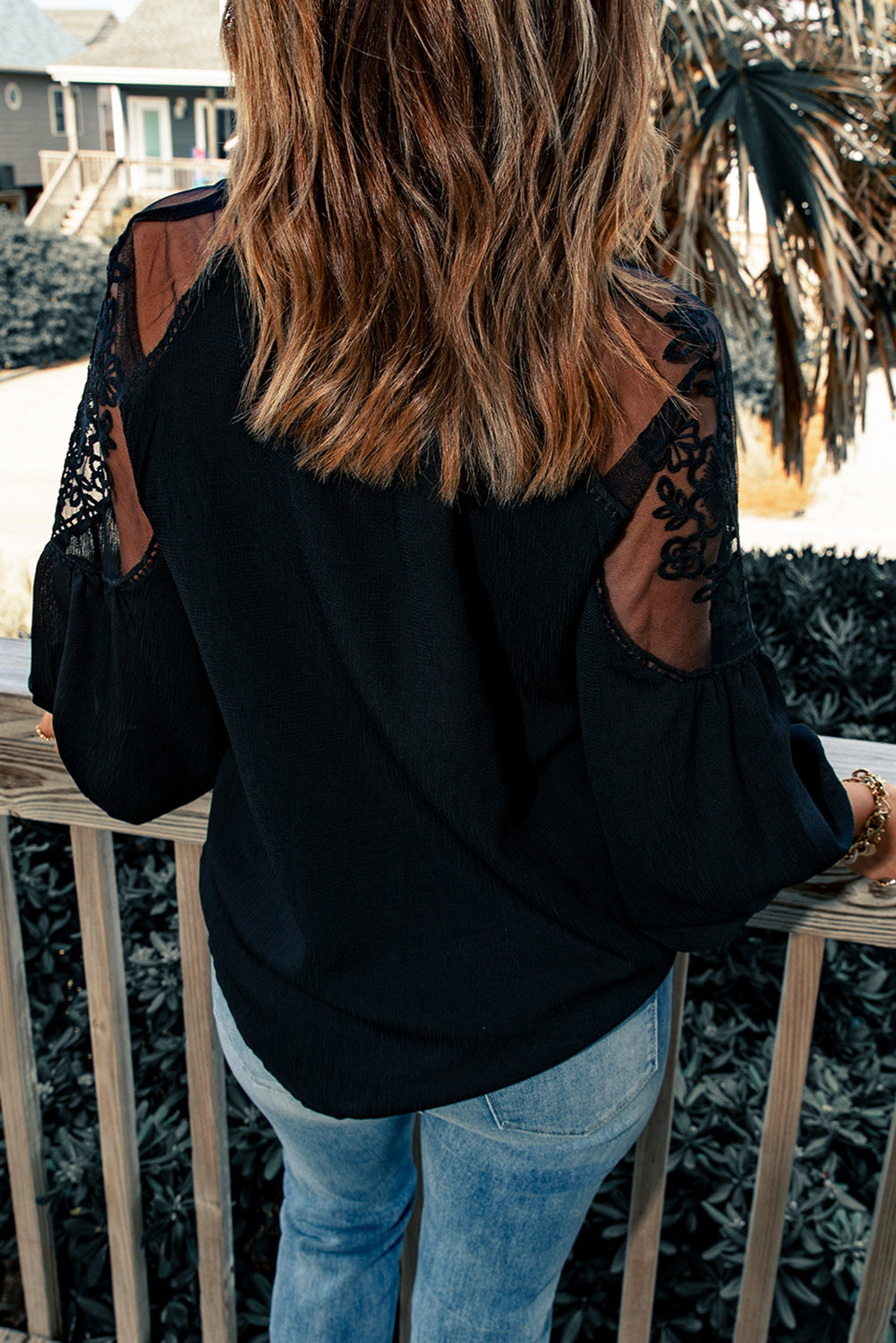Black sheer yoke embroidered blouse with lace sleeves and tie detail
