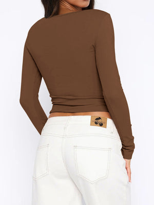 Button-down ribbed crop top in Coffee Brown with long sleeves, shown from the back.