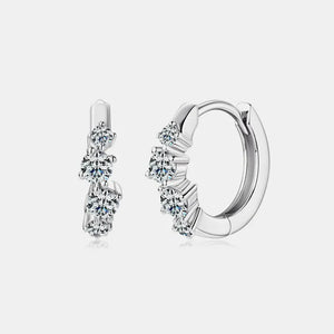 Silver pavé embellished mini hoop earrings with clear cubic zirconia stones.