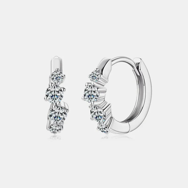 Silver pavé embellished mini hoop earrings with clear cubic zirconia stones.