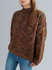 Textured brown mélange knit mock neck sweater with orange and yellow flecks.