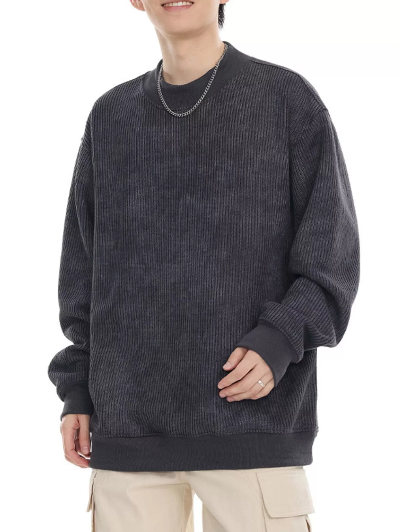 Dark Gray oversized ribbed sweatshirt with round neck and long sleeves.