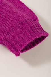Colorblock ribbed knit pullover sweater in magenta acrylic with ribbed cuff detail.