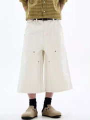 Men's cream cotton wide-leg cropped cargo pants with contrast stitching and raw hem